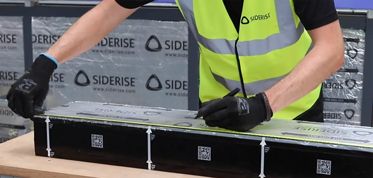 Siderise employee providing installation guidance demonstration